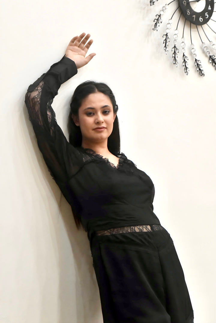Sheer Panel Lace Jumpsuit in Black